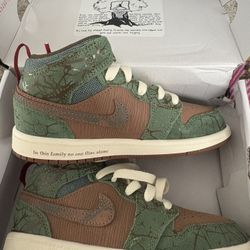 Air Jordan 1 Mid Green & brown camo/woodgrain-style 