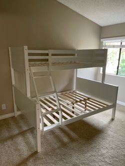 Twin/full bunk bed. Available in black & white. Assembly required. Assembly not included. Tax included. Free local delivery. $350 bunk bed only. $550 