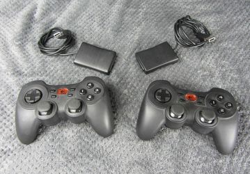 Two Logitech Cordless RumblePad-2 Controllers USB