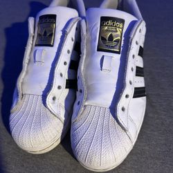 White Adidas Superstars