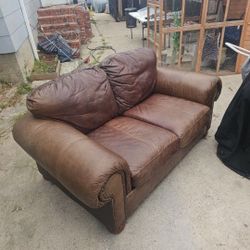 Matching leather sofa and love seat