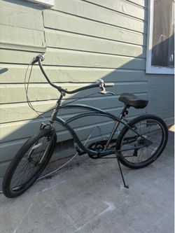 Dark green Electra beach cruiser