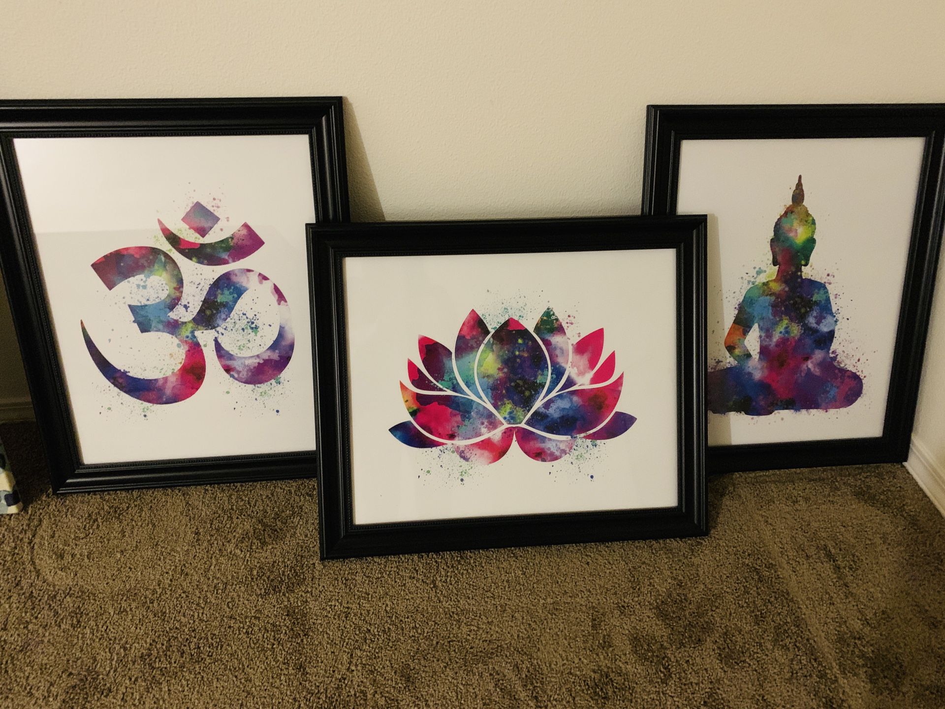 Om, lotus, Buddha watercolor prints in black frames