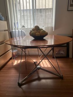 A 21st century 'Lem 90' coffee table / dining table  for Magis. and four chairs