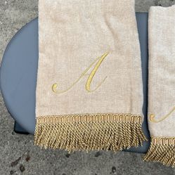 A / monogram towels