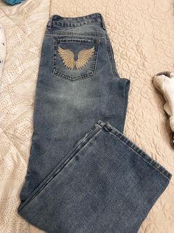 Light Wash Jeans with Gold Wing Embroidery