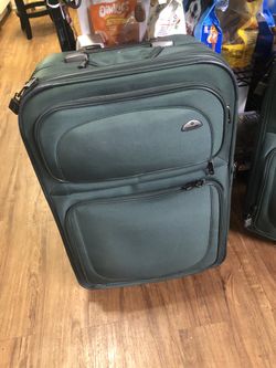 One Suitcase Left $15-27” Tall-19 1/2” Wide- 9 1/2” Deep 