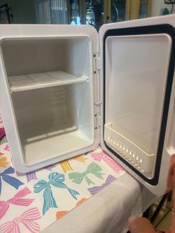 Pink mini fridge