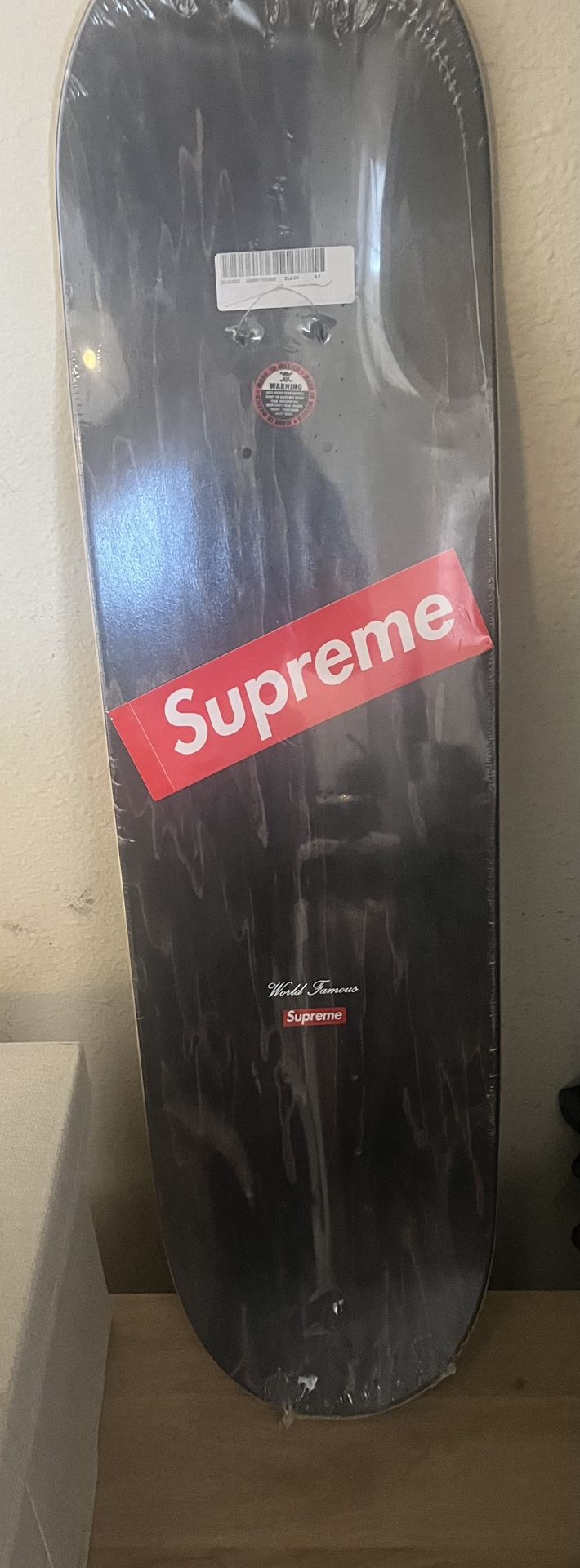 Supreme distorted logo skateboard deck