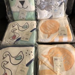 Brand new baby hooded bath towels seven dollars each