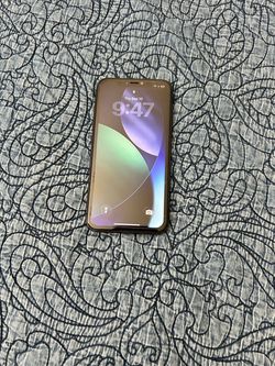 Good condition in the backside is broke and no charger