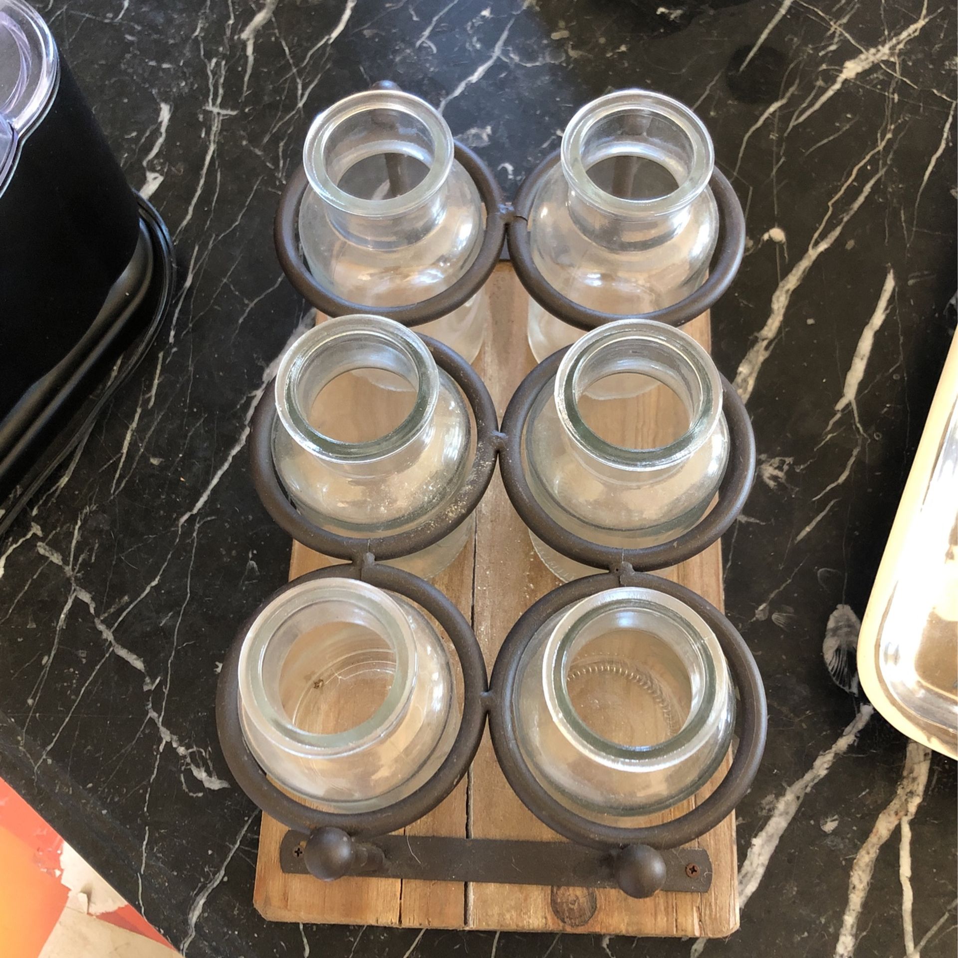 Six Glass Bottle And The Glass Holder