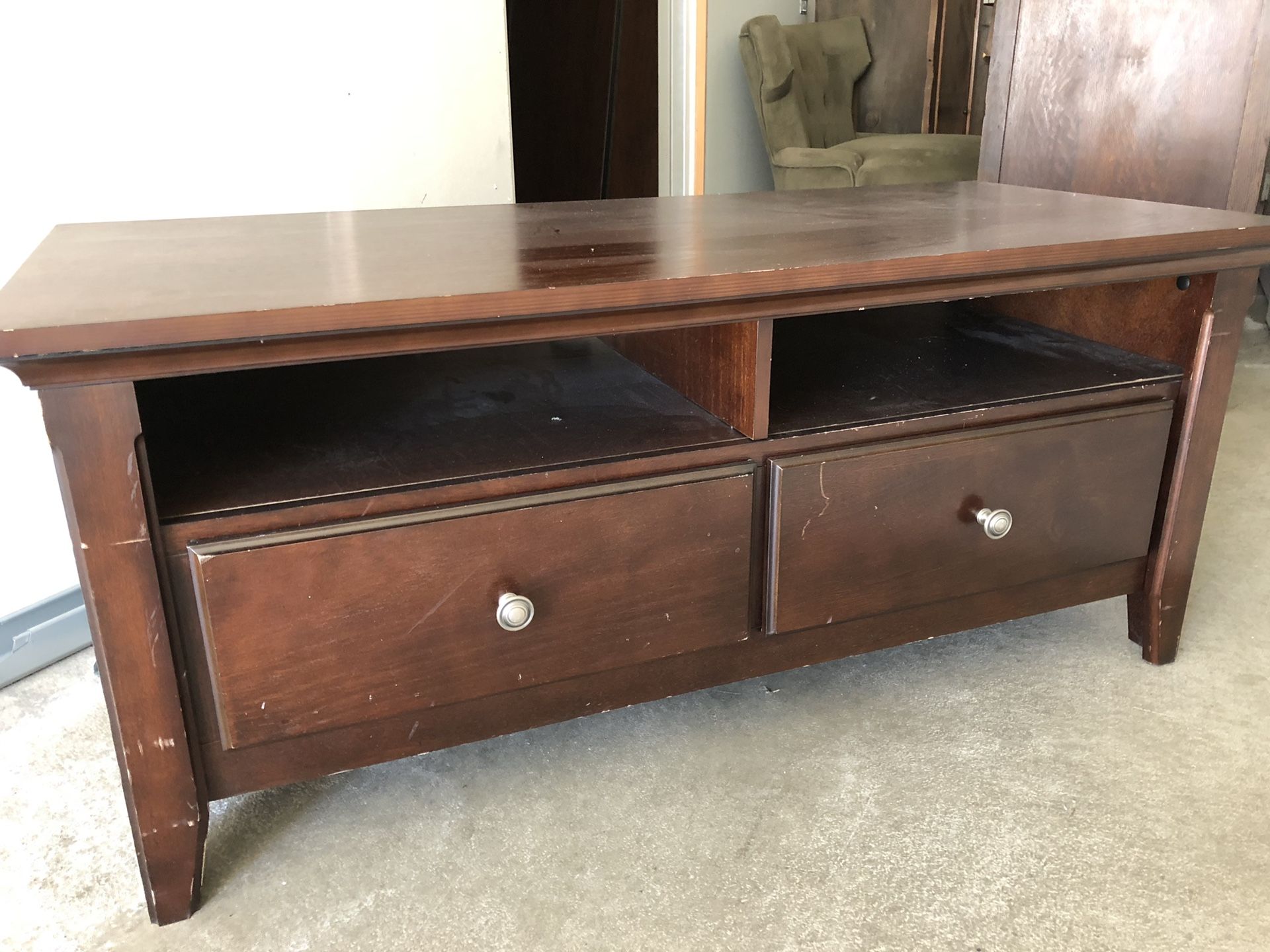 TV /entertainment stand. Both drawers on bottom work great.