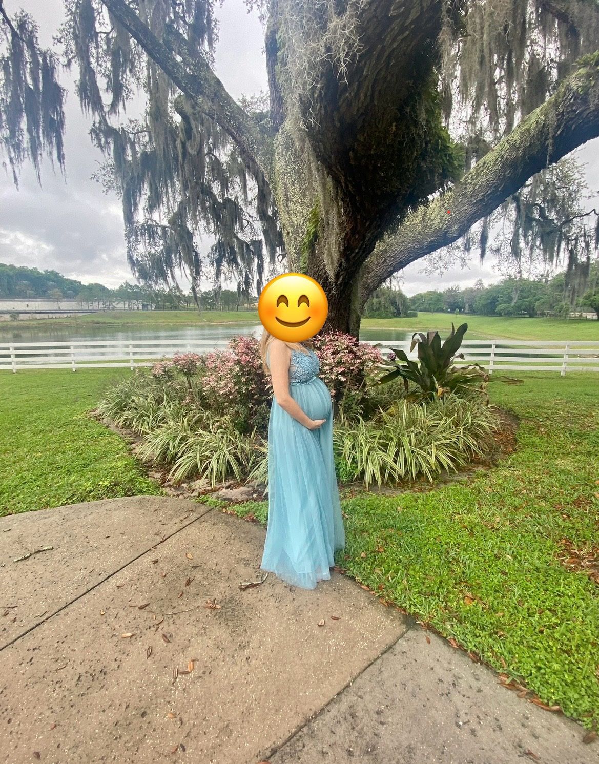 Elegant maternity dress with beautiful lace appliques in the bust area.