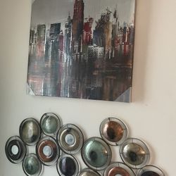 2 Pieces: Cityscape And Matching Metal Wall Art 