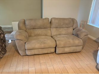 Two Electric recliner couches