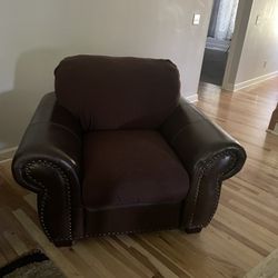 Two Couches And one Large Chair With Covers
