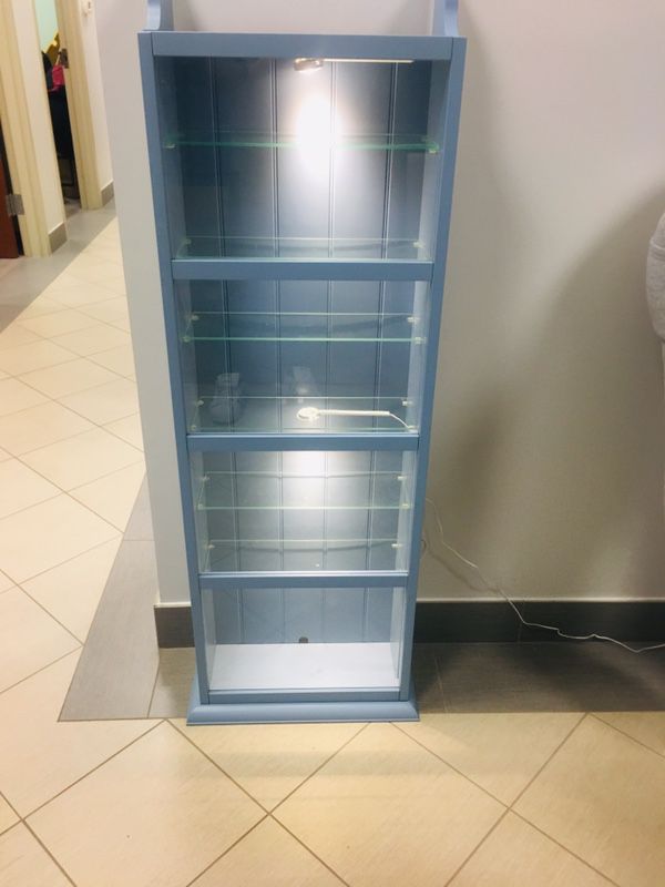 2 Blue Glass display cases. $40 for each