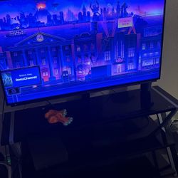 52 In Sharp tv With Mounted Tv stand