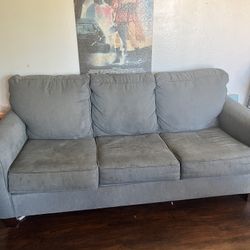 Three Seater couch With Pull Out Mattress 