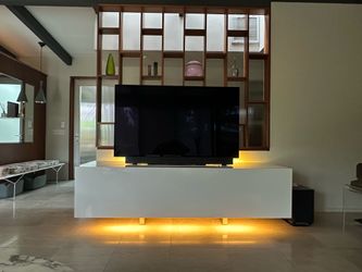 White lacquer media console designed by Lodovico Acerbis