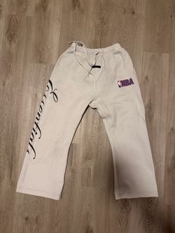 Fear of God Essentials NBA Flare Sweatpants in Cream White (size: xsmall)