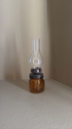 Glass tea light holder