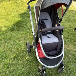 A Nice, Beautiful, Convertible Stroller,that You Can Use From Birth.  It Has An Extra-large Stroller Basket (NO SHIPPING)