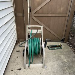 Hose And Reel And Sprinkler 