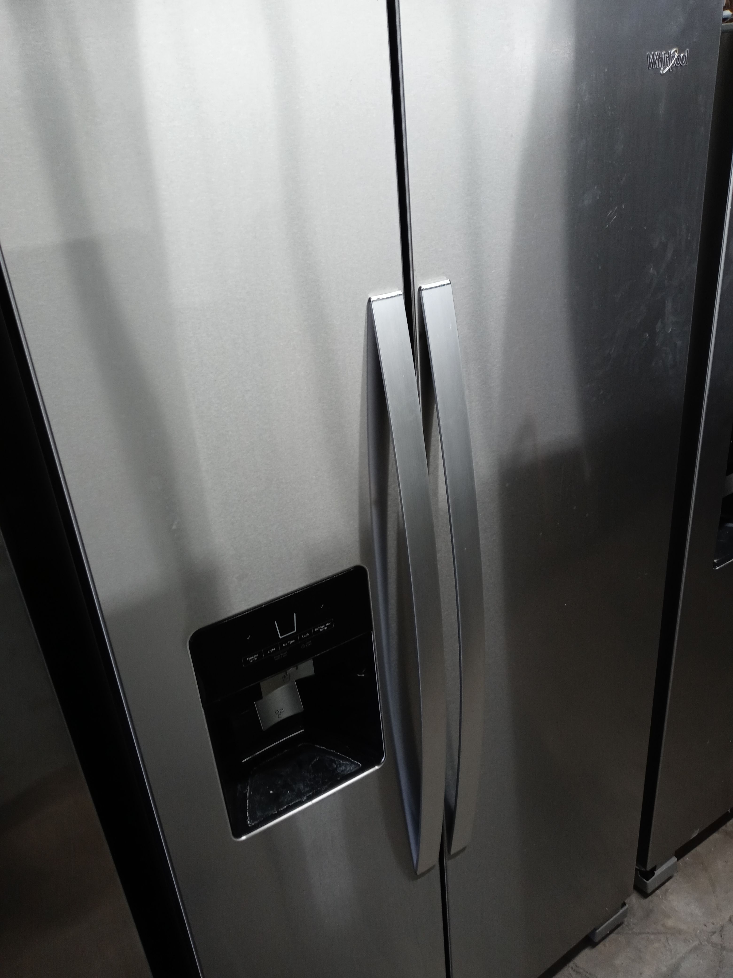 Whirlpool stainless steel side by side refrigerator - Free delivery