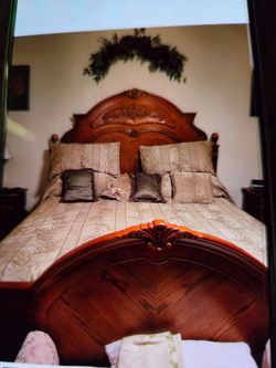 Queen size bedroom set headboard football, no mattress and three large pieces of hutch.All would perfect very heavy