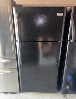 Black Frigidaire Refrigerator And Freezer