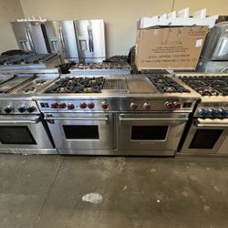 WOLF 60 WIDTH STAINLESS STEEL RANGE WITH RED KNOBS