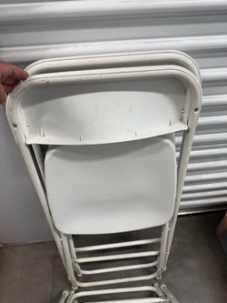 White folding chairs