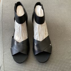 Naturalized Black Leather Crisscross Ankle Strap Sandals