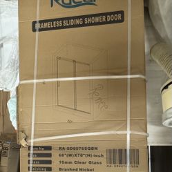 FRAMELESS SHOWER ENCLOSURE 