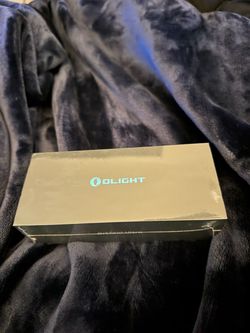 Olight Flashlight in Box