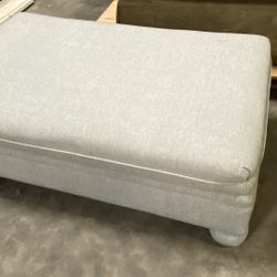 Upholstered rectangular ottoman 