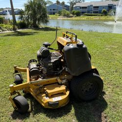 Hustler Mower, 52” , Kawasaki Engine 