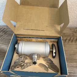 New vintage aluminum cookie and pastry press with 8 form plates and pastry tip Price is firm