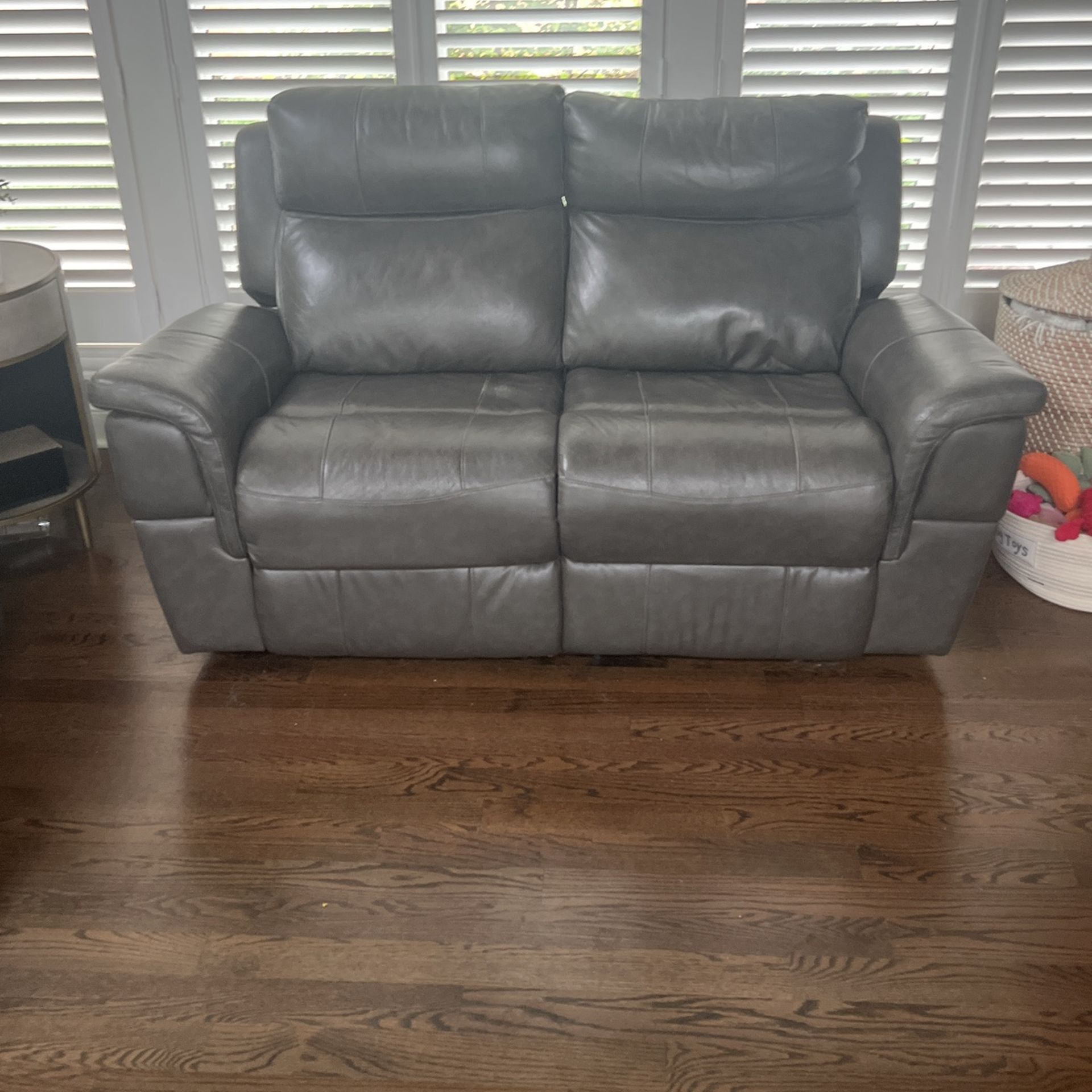 Leather electric reclining, both sides loveseat