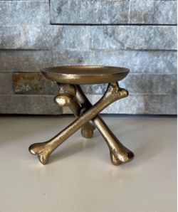 Gold bones candle holder