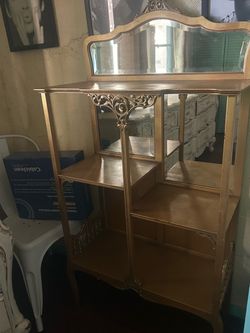 Gold mirrored open cabinet