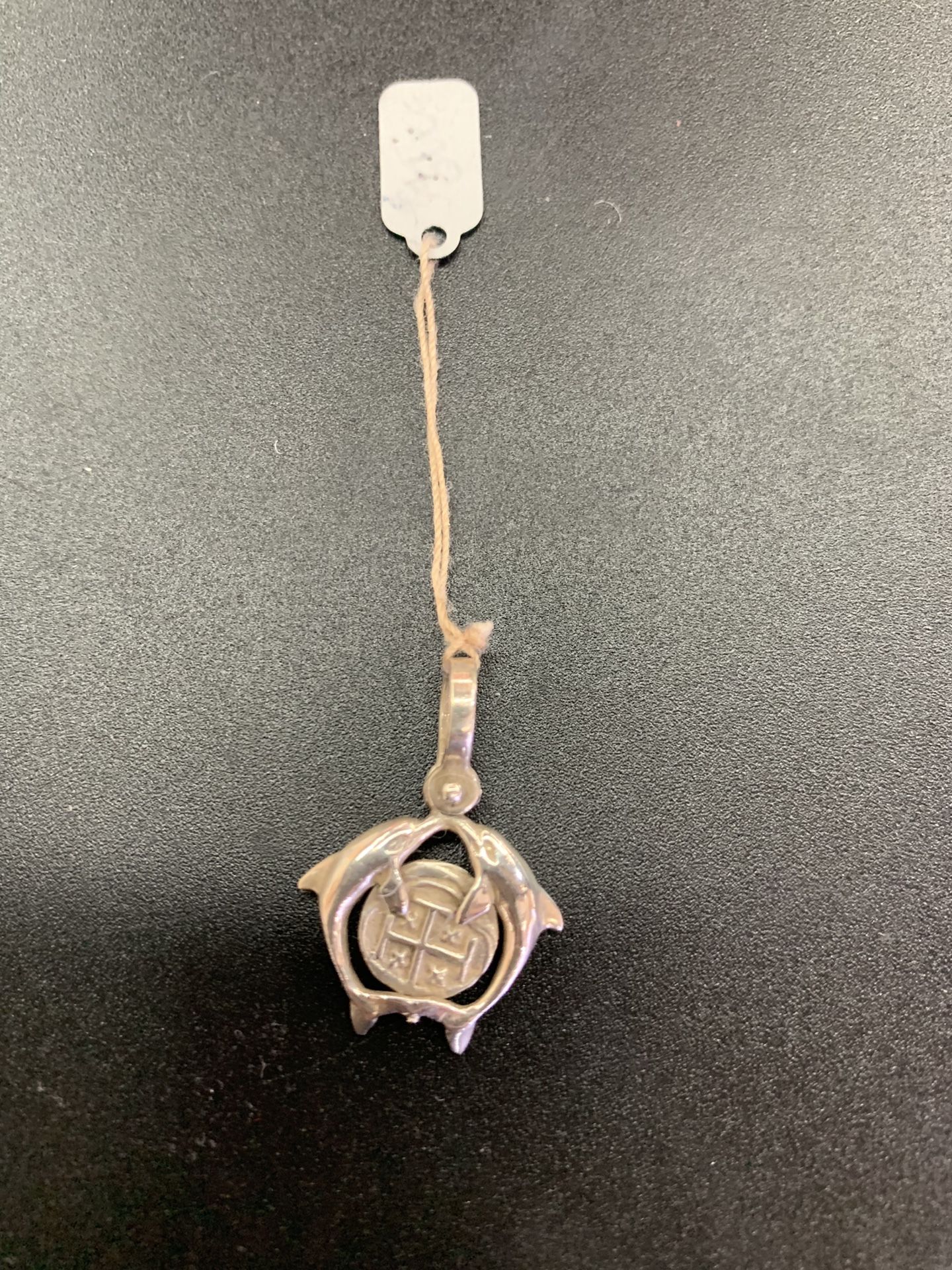 Atocha silver coin pendant in dolphins