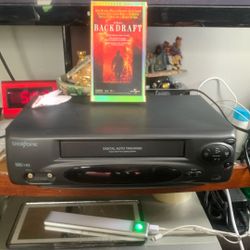 Broksonic  VHS HQ      works great.    One movie    remote include.