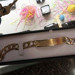 Cuban link id bracelet 9in 14k gold