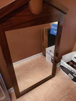 Big mirror with brown frame ,28 in wide, 47 in long