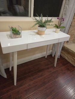 Two white side tables