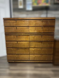 Very clean dresser and nightstand