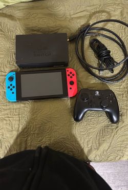nintendo switch with controller dock and charger and hdmi cable